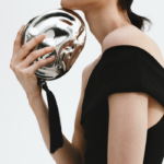 Asymmetric metal clutch