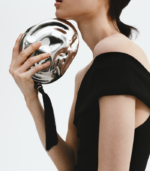 Asymmetric metal clutch
